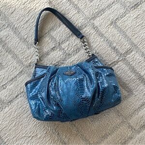 Simply Vera Wang City Girl elevated casual hobo bag in a blue faux snakeskin